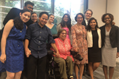 A group of diverse young Fellows with Judith Heumann